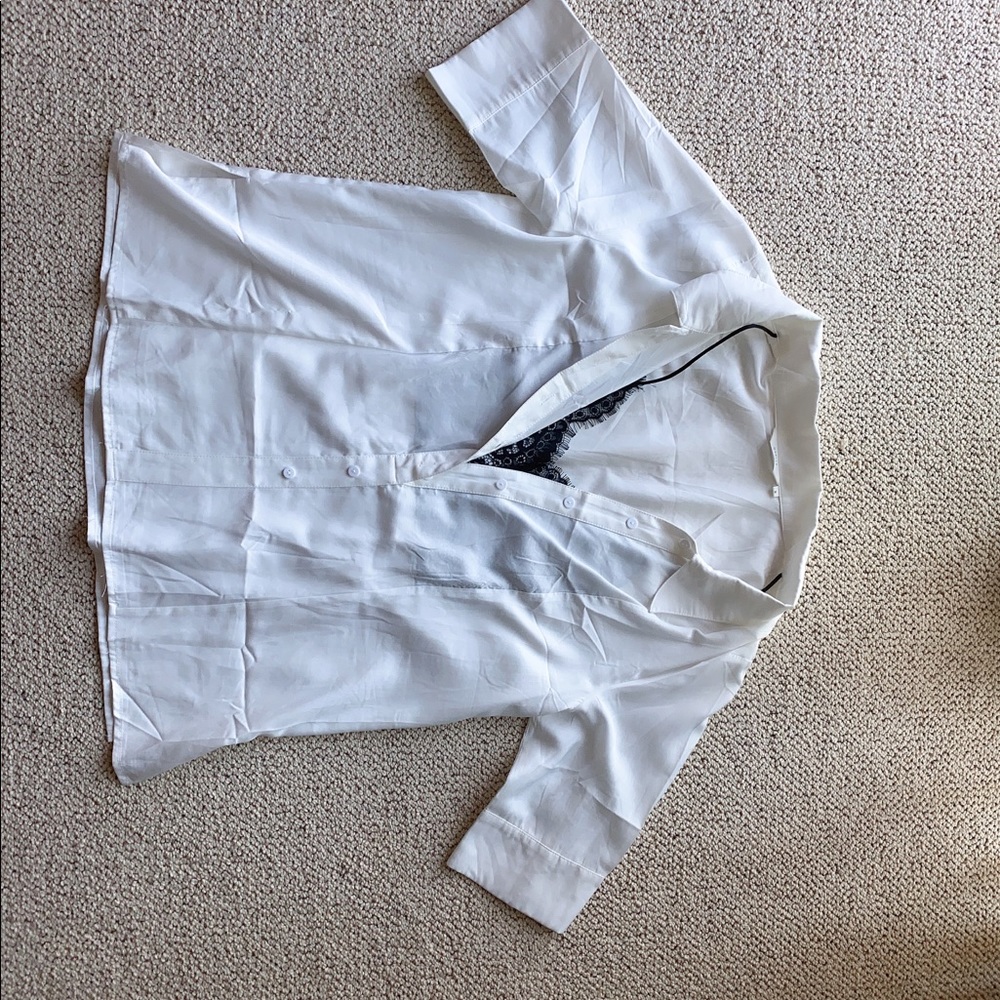 white shirt with black lace inside